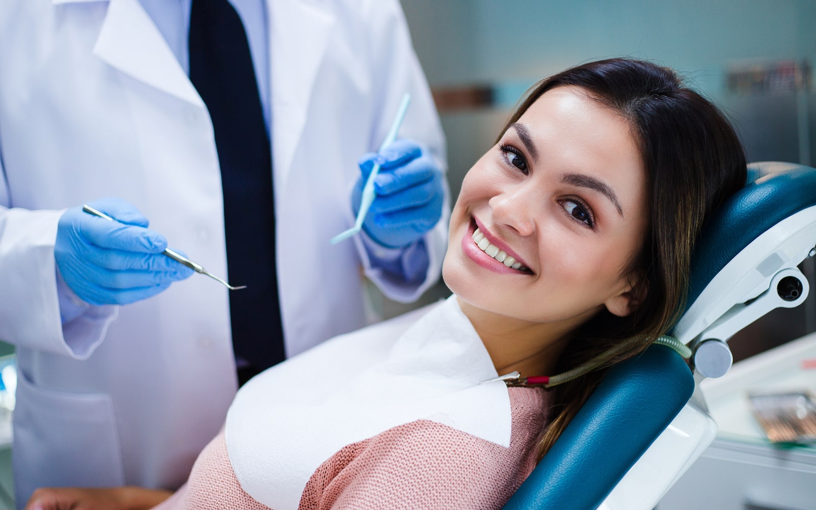 Woman smiling at endodontic office