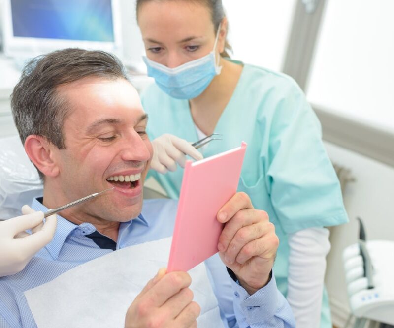 patient with mirror gap after tooth extraction