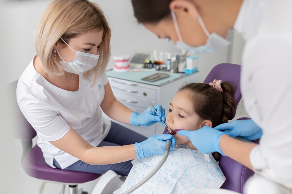 Child to the dentist. Child in the dental chair